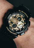 CASIO G-SHOCK ANALOGUE / DIGITAL GOLD DIAL BLACK RESIN GA140GB-1A1